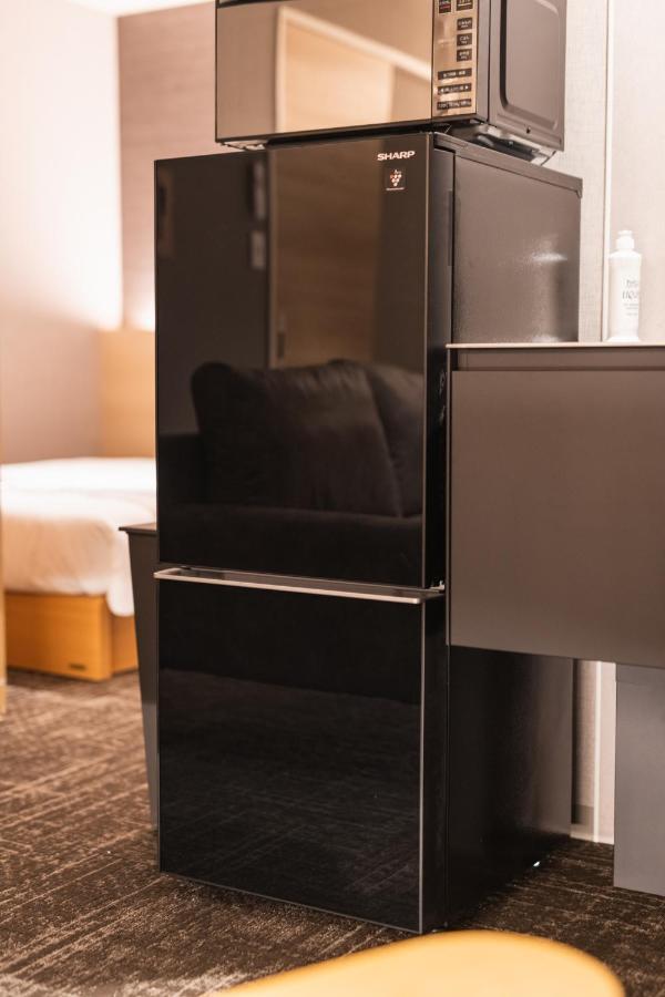 Aparthotel Grand Base Kagoshima Chuo Extérieur photo